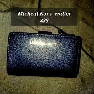Micheal Kors wallet brand new never used